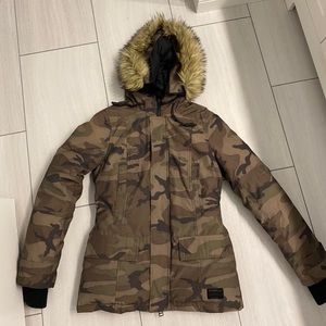 Aritzia Tna Larsen parka in camouflage